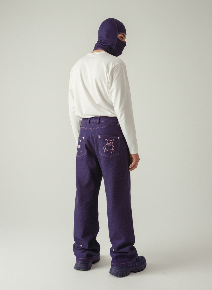 Back view handcrafted denim jeans — embroidered pockets, premium denim — multifunctional denim pants.  